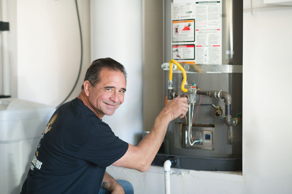 Water Heater Pros inspecting water heater