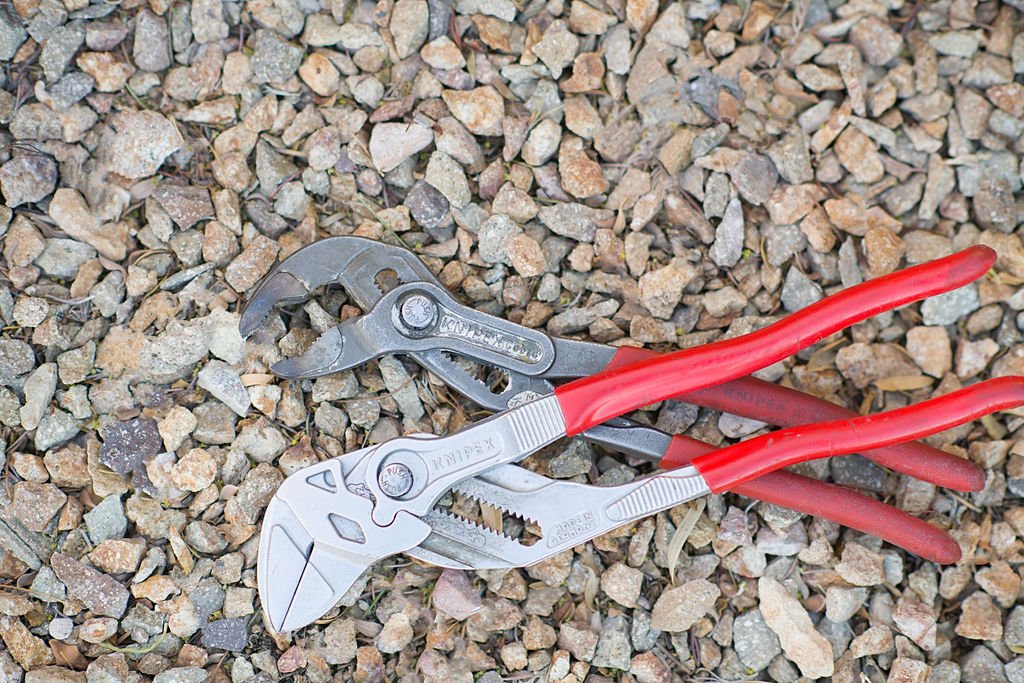 Wrenches laying on rocks