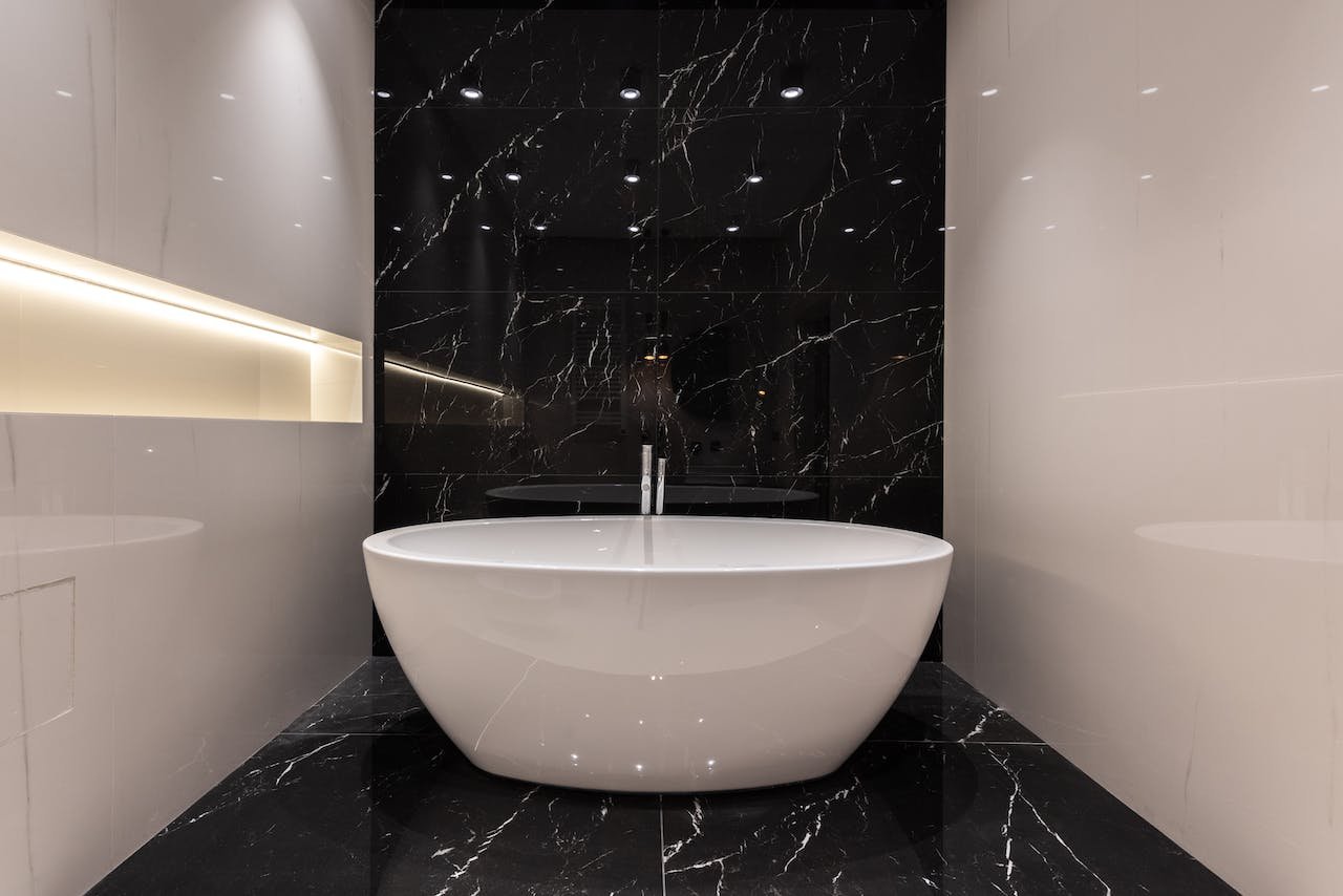 White tub with black floor