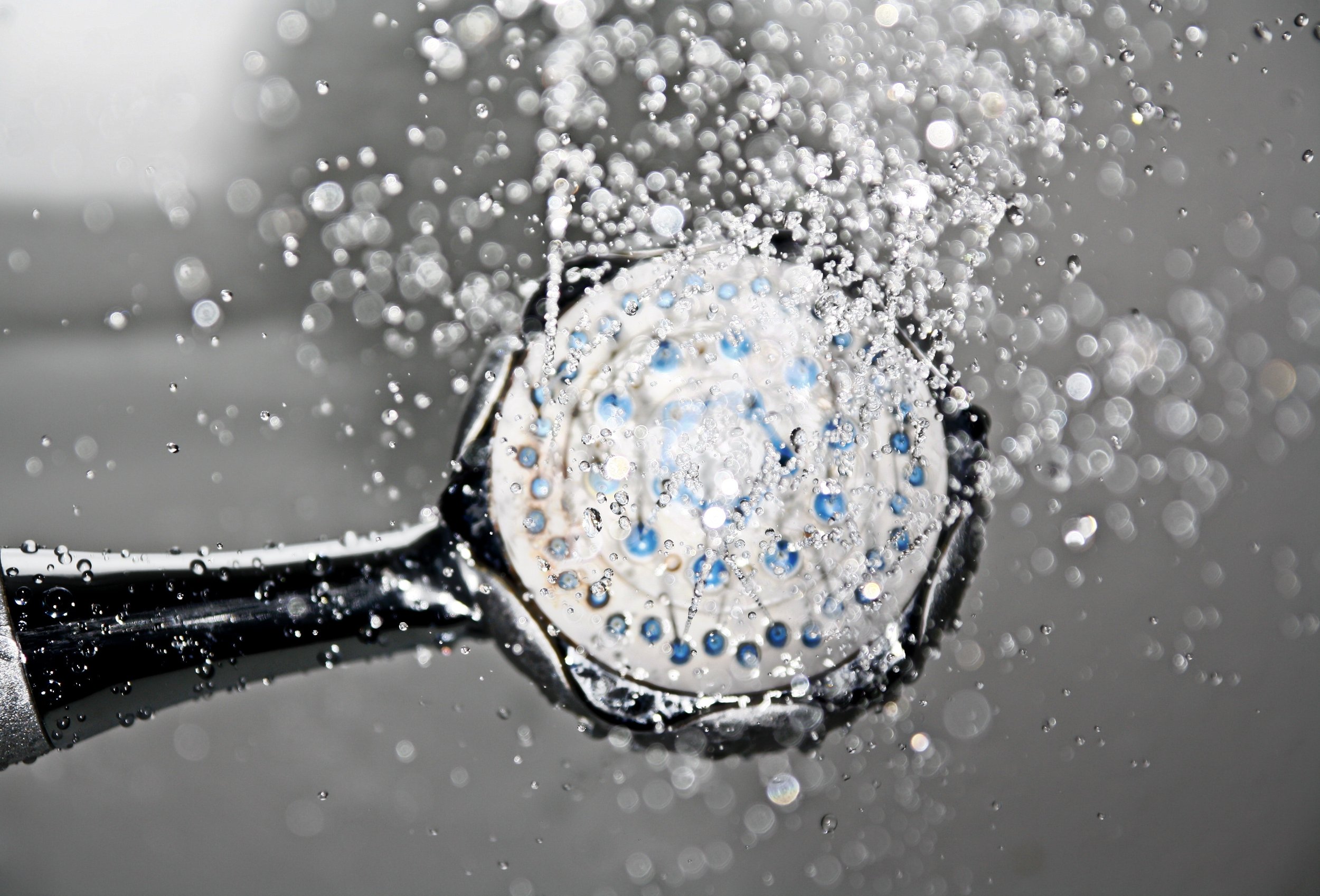 shower head spraying water